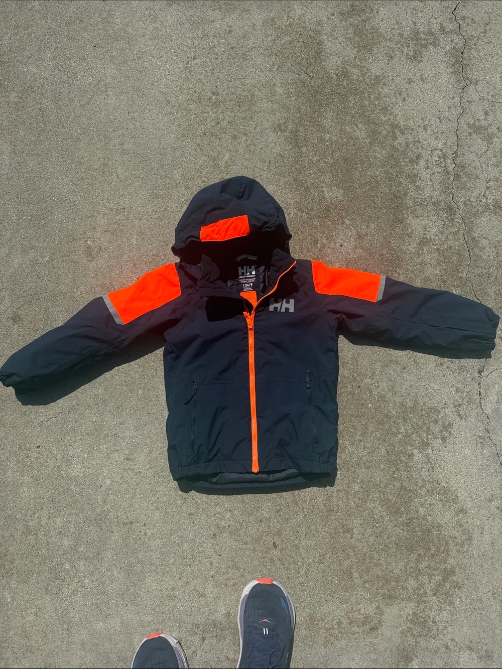 Helly Hansen Navy Jacket with Bright Orange Accents